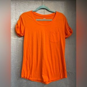 Women’s orange t shirt with pocket, size M
